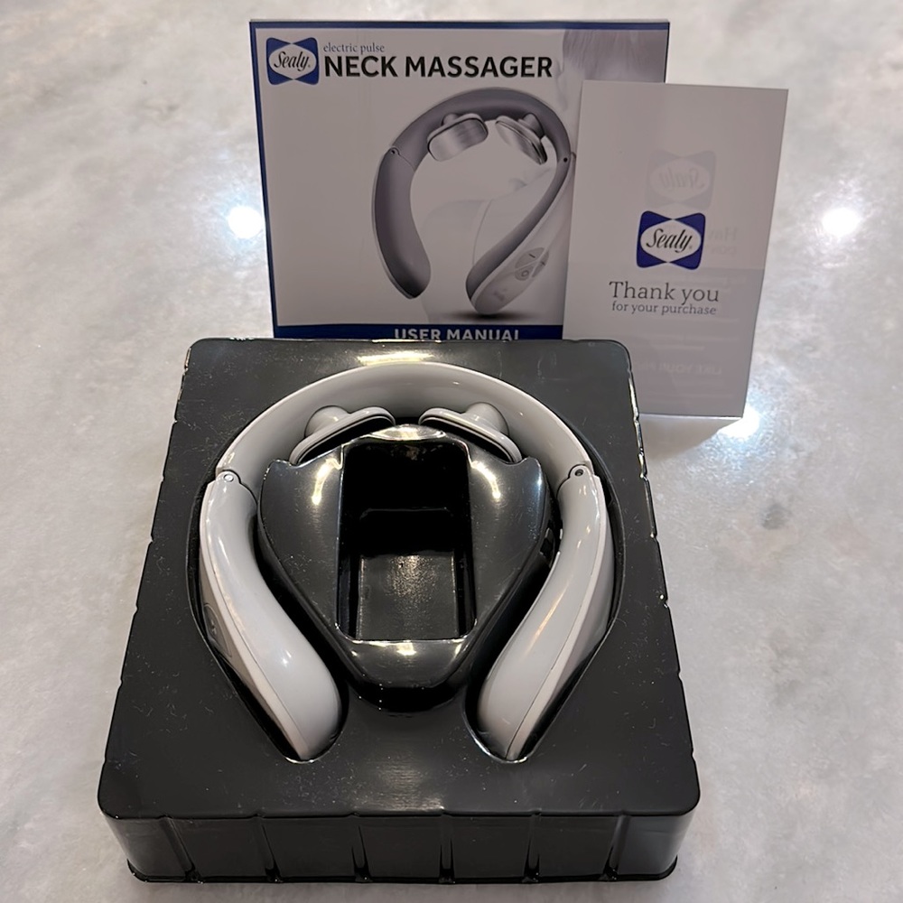NIB Seal y Electric Pulse Neck Massager